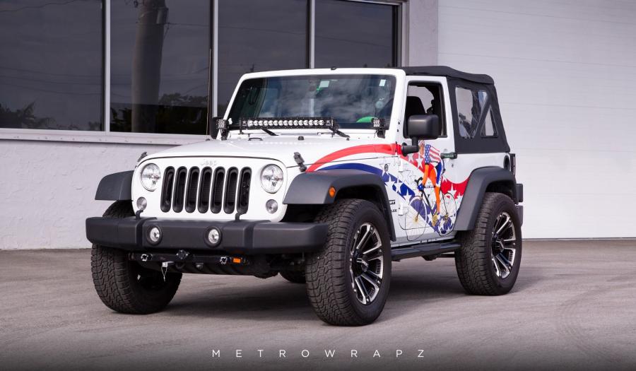  Jeep Wrangler Sport TEN SPD by MetroWrapz 2019 года  (фото 1 из 4)